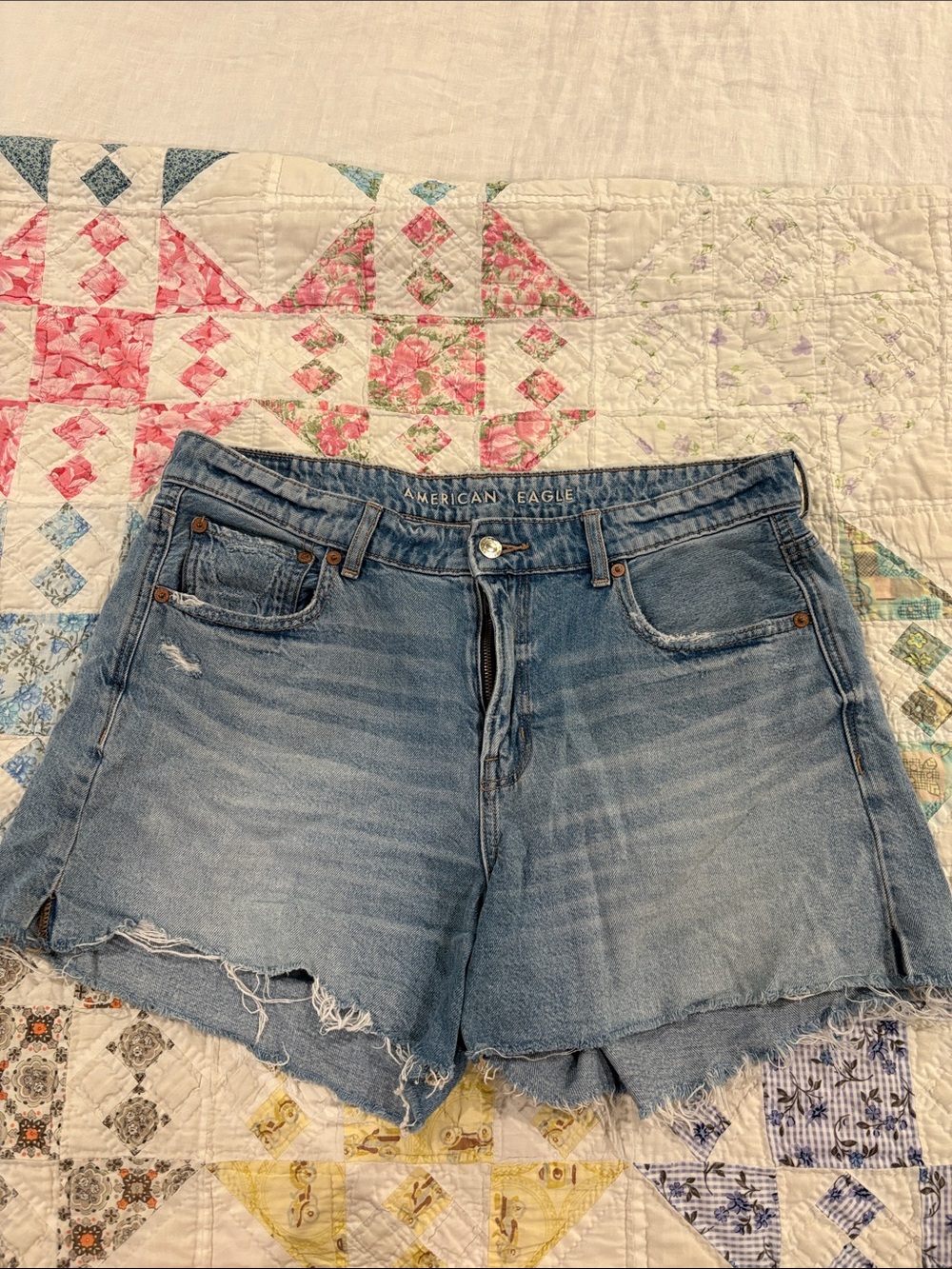 American Eagle Outfitters Light Wash Frayed Hem Denim Shorts
